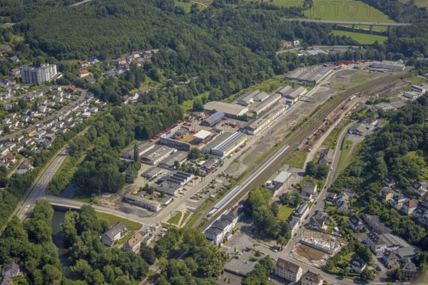 Aerial view, Arnsberg railway station, industrial area Zu den Werkstätten, Arnsberg, Sauerland, North Rhine-Westphalia, Germany, railway tracks, railway station, DE, Deutsche Bahn AG, Europe, commercial enterprises, commercial area, commercial area, commercial location, commercial use, main station, main railway station, Hochsauerlandkreis, industrial area, industrial location, aerial view, aerial photography, aerial photography, overview, bird's-eye view, birds-eyes view, overview