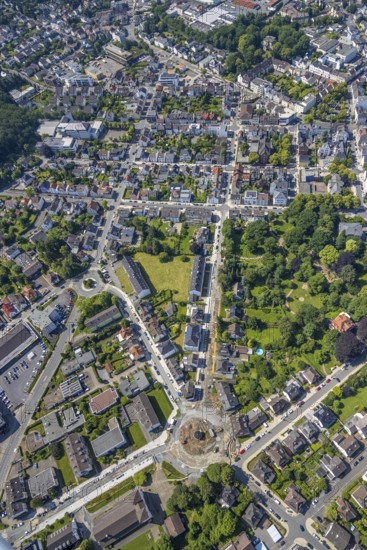 Aerial view, construction site and redesign of roundabout Pfarrer-Leo-Reiners-Platz, formerly Ehmsenplatz, Alter Holzweg, catholic St. Michael Church, Neheim, Arnsberg, Sauerland, North Rhine-Westphalia, Germany, place of worship, construction work, construction area, construction site, building plots, construction project, construction site, DE, Europe, religious community, place of worship, sacred site, Hochsauerlandkreis, church, church community, denomination, roundabout, roundabout, aerial view, aerial photography, aerial photography, religion, religious site, overview, bird's-eye view, birds-eyes view, overview