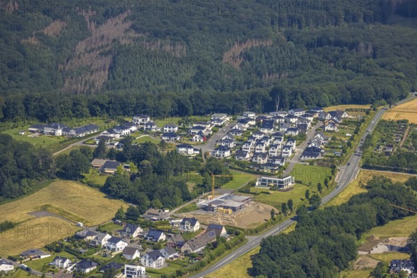 Aerial view, construction site new building Am Dollberg, Zur Waterlappe corner Zur Oldenburg, Neheim, Arnsberg, Sauerland, North Rhine-Westphalia, Germany, construction work, construction area, construction site, building plots, construction crane, construction project, construction site, DE, Europe, Hochsauerlandkreis, aerial photograph, aerial photography, aerial photography, new building, overview, bird's-eye view, bird's-eye view, overview