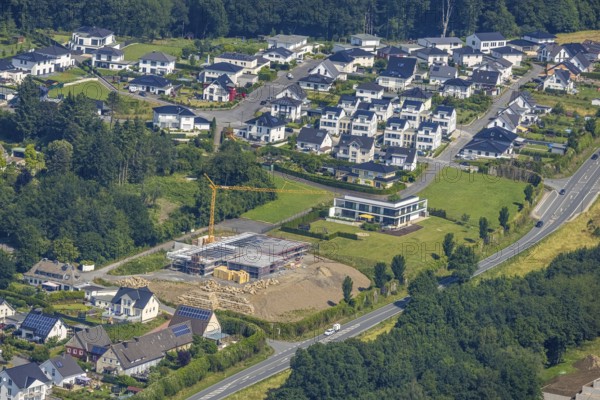 Aerial view, construction site new building Am Dollberg, Zur Waterlappe corner Zur Oldenburg, Neheim, Arnsberg, Sauerland, North Rhine-Westphalia, Germany, construction work, construction area, construction site, building plots, construction crane, construction project, construction site, DE, Europe, Hochsauerlandkreis, aerial photograph, aerial photography, aerial photography, new building, overview, bird's-eye view, bird's-eye view, overview