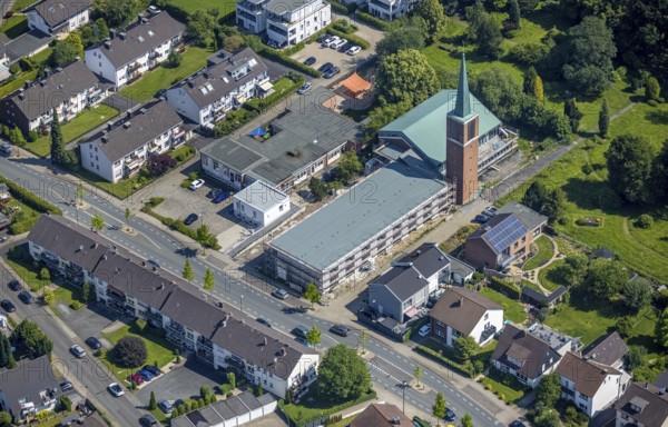 Aerial view, construction site and new building for day clinic as well as the creation of assisted living in the Pauluskirche, evang. Bonhoeffer kindergarten, Neheim, Arnsberg, Sauerland, North Rhine-Westphalia, Germany, construction work, construction area, construction site, building plots, construction project, construction site, DE, Europe, Hochsauerlandkreis, aerial view, aerial photography, aerial photography, new building, overview, bird's eye view, assisted living, birds-eyes view, former church, overview