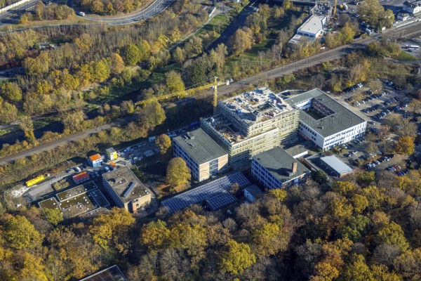 Aerial view, construction site and new building at the Berufskolleg Berliner Platz in the district Hüsten in Arnsberg, Sauerland, North Rhine-Westphalia, Germany, Arnsberg, construction work, construction area, building site, building plots, construction project, construction site, DE, Europe, aerial view, aerial photography, aerial photography, new building, overview, bird's-eye view, overview
