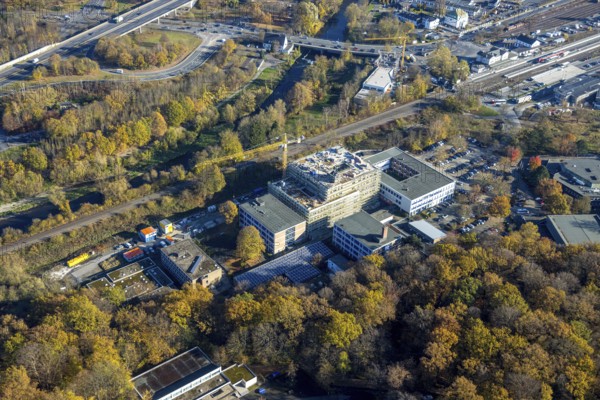 Aerial view, construction site and new building at the Berufskolleg Berliner Platz in the district Hüsten in Arnsberg, Sauerland, North Rhine-Westphalia, Germany, Arnsberg, construction work, construction area, building site, building plots, construction project, construction site, DE, Europe, aerial view, aerial photography, aerial photography, new building, overview, bird's-eye view, overview