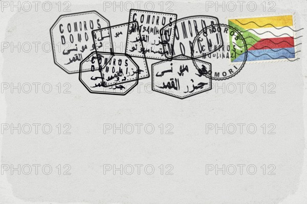 Comoros Vintage Postcard with Flag Stamp and City Postmarks