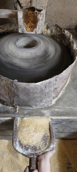 Water mill for grinding corn, Mill Stone, Making corn flour, Minas Gerais, Brazil