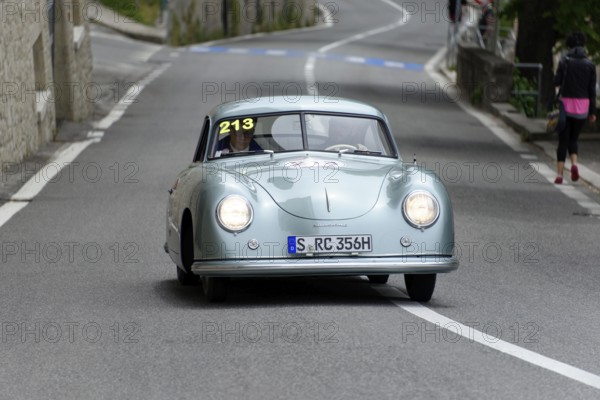 No. 213, Porsche 356 1100 Coupé, model year 1951, Blue retro car drives through a winding road, Mille Miglia 2014 or 1000 Miglia, classic car race, San Marino, Italy