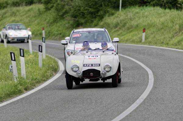White classic car on rural road in green surroundings, classic car, car race, Mille Miglia, 1000 Miglia, 2015, Tuscany, Rome Lake Garda, Italy