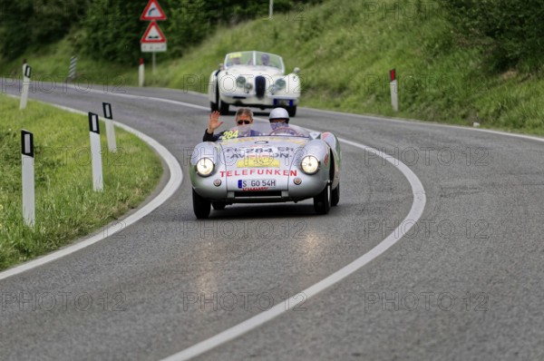 Classic car with two people on a winding country road, classic car, car race, Mille Miglia, 1000 Miglia, 2015, Tuscany, Rome Lake Garda, Italy