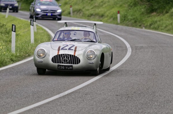 Silver sports car on a winding road surrounded by green landscape, classic car, car race, Mille Miglia, 1000 Miglia, 2015, Tuscany, Rome Lake Garda, Italy