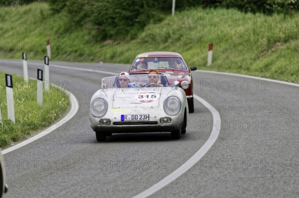 Open-top classic car followed by another car on a country road, classic car, car race, Mille Miglia, 1000 Miglia, 2015, Tuscany, Rome Lake Garda, Italy