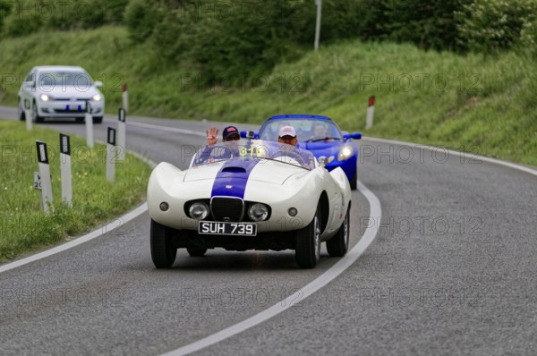 White classic car accompanied by a blue vehicle on a country road, classic car, car race, Mille Miglia, 1000 Miglia, 2015, Tuscany, Rome Lake Garda, Italy