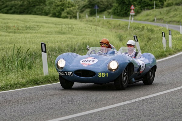 Blue racing car with two people on a winding country road, classic car, car race, Mille Miglia, 1000 Miglia, 2015, Tuscany, Rome Lake Garda, Italy