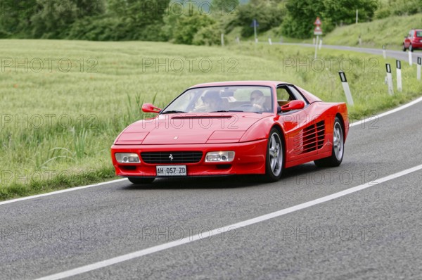 Red Ferrari on a rural road during a race, classic car, car race, Mille Miglia, 1000 Miglia, 2015, Tuscany, Rome Lake Garda, Italy