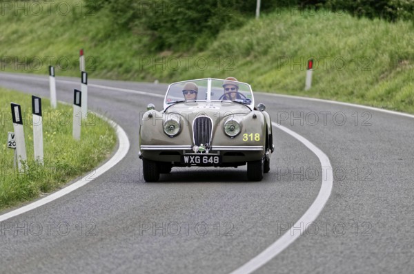 Classic vintage car with two occupants on a country road, vintage car, car race, Mille Miglia, 1000 Miglia, 2015, Tuscany, Rome Lake Garda, Italy