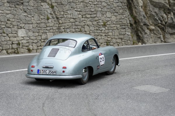 No. 213, Porsche 356 1100 Coupé, year of construction 1951, green vintage car from the rear view, driving down a winding road, Mille Miglia 2014 or 1000 Miglia, vintage car race, San Marino, Italy
