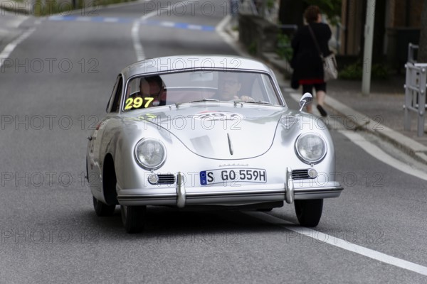 No. 297, Porsche 356 1500 Speedster, year of construction 1954, silver classic car with racing number, driving on a road with a driver, Mille Miglia 2014 or 1000 Miglia, classic car race, San Marino, Italy