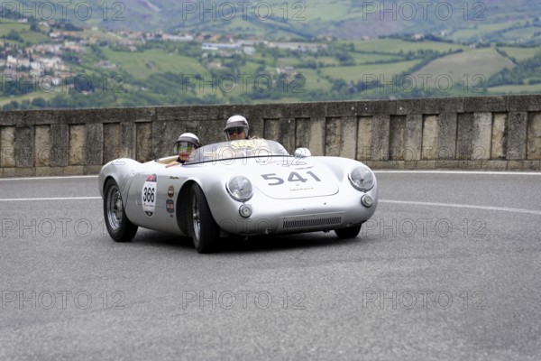 No. 366, Porsche 550 Spyder RS, built in 1955, silver classic racing car with two drivers on a winding track in mountainous surroundings, Mille Miglia 2014 or 1000 Miglia, classic car race, San Marino, Italy
