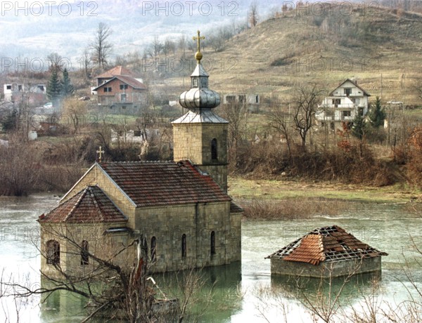 BIH, Tuzla, 01.01.1996 -- A flooded church in the former frontline area near Tuzla. -- A flooded church near an embattled area near Tuzla. The building has been flooded when Serbs destroyed the dam of a mountain water reservoir during the civil war.   Bosnia Hercogovina, Eastern Europe