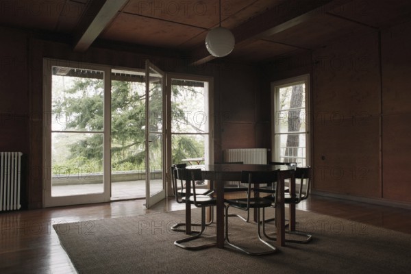 Potsdam-Caputh, DEU, Germany. 26.04.2002 - Albert Einstein's summer residence: living room of the famous scientist. (desk, interior, furniture, interior, history, museum) -