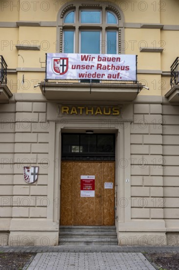 Reconstruction in the Ahr Valley, after the flood of July 2021, buildings that have not yet been renovated or demolished can be found in many towns, but most buildings have now been repaired or rebuilt, town hall near Altenahr, Rhineland-Palatinate