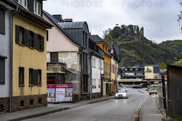 Reconstruction in the Ahr Valley, after the flood of July 2021, buildings that have not yet been renovated or demolished can be found in many towns, but most buildings have now been repaired or rebuilt, Sparkassen branch near Altenahr, Are Castle, Rhineland-Palatinate