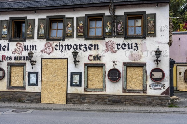 Reconstruction in the Ahr Valley, after the flood of July 2021, buildings that have not yet been renovated or demolished can be found in many towns, but most buildings have now been repaired or rebuilt, Hotel Zum Schwarzen Kreuz near Altenahr, Rhineland-Palatinate