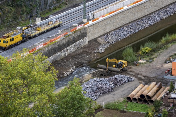 Reconstruction in the Ahr Valley, after the flood of July 2021, restoration of the railway infrastructure of the Ahr line, 29 km of tracks, 15 railway bridges, 7 were renovated, stations and stops renovated or renewed, 885 masts were built for the overhead line of the new electrification and 55 km of overhead lines were redrawn, here work on the cycle path bridge and railway bridge near Altenahr, Rhineland-Palatinate