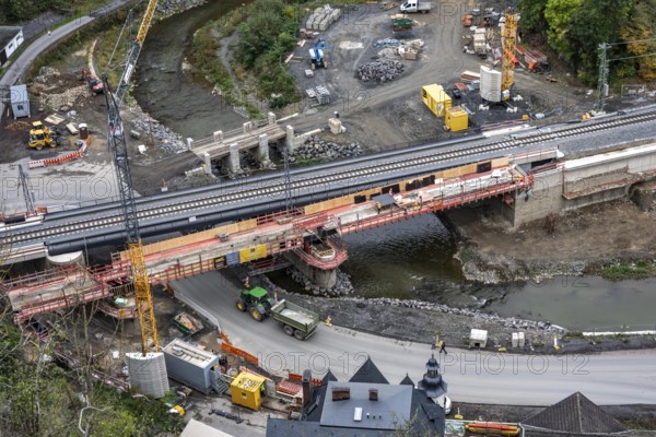 Reconstruction in the Ahr Valley, after the flood of July 2021, restoration of the railway infrastructure of the Ahr line, 29 km of tracks, 15 railway bridges, 7 were renovated, stations and stops renovated or renewed, 885 masts were built for the overhead line of the new electrification and 55 km of overhead lines were redrawn, here work on the cycle path bridge and railway bridge near Altenahr, Rhineland-Palatinate