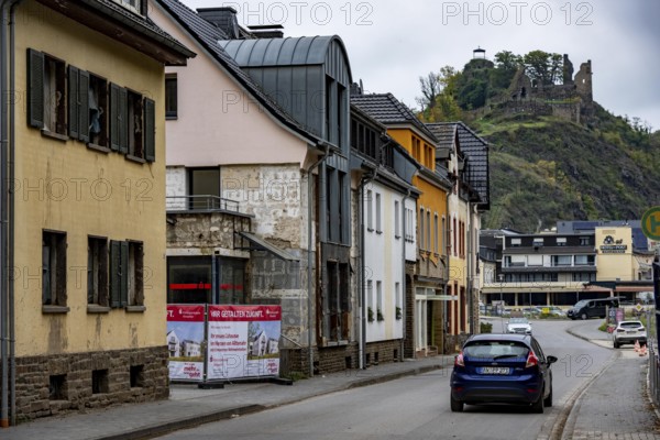 Reconstruction in the Ahr Valley, after the flood of July 2021, buildings that have not yet been renovated or demolished can be found in many towns, but most buildings have now been repaired or rebuilt, Sparkassen branch near Altenahr, Are Castle, Rhineland-Palatinate