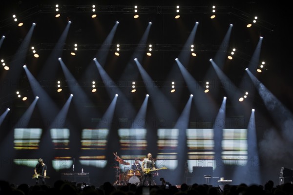Dominic Miller (guitarist), Chris Maas (drummer), Sting (guitarist, real name: Gordon Matthew Thomas Sumner, CBE) live on Sting 3.0 tour at Berlin's Uber Arena on 16.10.2025