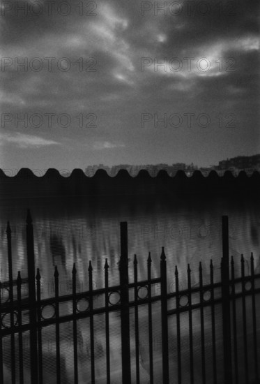 BIH, Bosnia, Sarajevo, 12.01.2006, View of a cemetery through a fence