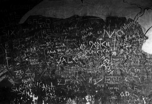 BIH, Bosnia, Screbrenica, 10.07.2005, Graffitti on the wall of the entrance to a discotheque