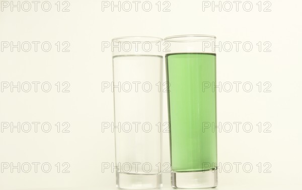 Two glasses of green liquid on white background, São Paulo, Brazil