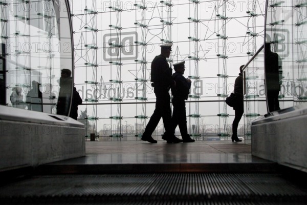 Berlin 2010-11-24 Police officer patrols Berlin Central Station. DEU Berlin 2010-11-24 Police Guards at Berlin's Main Station