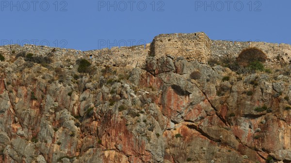 Brick ruins on a rocky landscape under blue sky, Monemvasia, Monemvassia, Malvasy, Byzantine small town, rocky island, fortress, Laconia, Peloponnese, peninsula, Greece