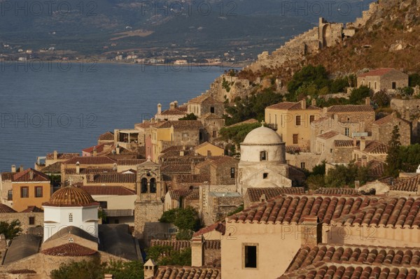 Soft morning light, Holy Church of the Blessed Virgin Mary Myrtidiotissa (or Criticias), Holy Church of Christ in Chains, Elkomenos Christos, Golden Dawn in a Hill Town with Sea View and Historic Buildings, Monemvasia, Monemvassia, Malvasy, Small Byzantine Town, Rock Island, Fortress, Laconia, Peloponnese, Peninsula, Greece