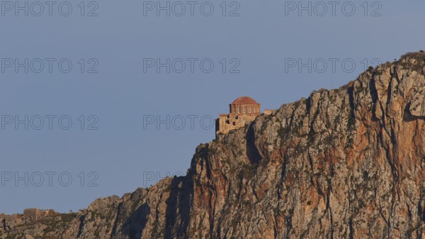 Orhodox church of Hagia Sophia, small chapel on a rocky mountain in the sun, Monemvasia, Monemvassia, Malvasy, Byzantine small town, rocky island, fortress, Laconia, Peloponnese, peninsula, Greece