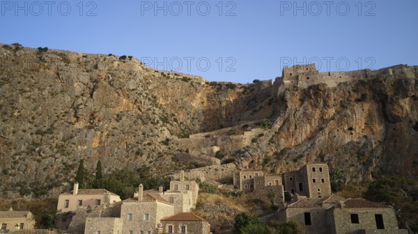 Drone shot, rocky landscape with old ruins and medieval architecture, Monemvasia, Monemvassia, Malvasy, Byzantine small town, rocky island, fortress, Laconia, Peloponnese, peninsula, Greece