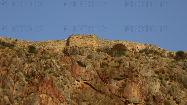 Soft morning light, stone wall of an old fortress on top of a rock, Monemvasia, Monemvassia, Malvasy, Byzantine small town, rocky island, fortress, Laconia, Peloponnese, peninsula, Greece