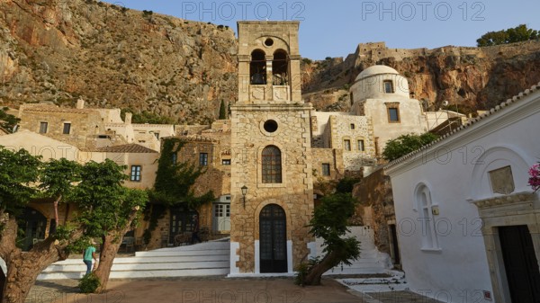 Holy Church of Christ in Chains, Elkomenos Christos, historic church buildings with imposing bell tower in front of rocks, Monemvasia, Monemvassia, Malvasy, small Byzantine town, rocky island, fortress, Laconia, Peloponnese, peninsula, Greece