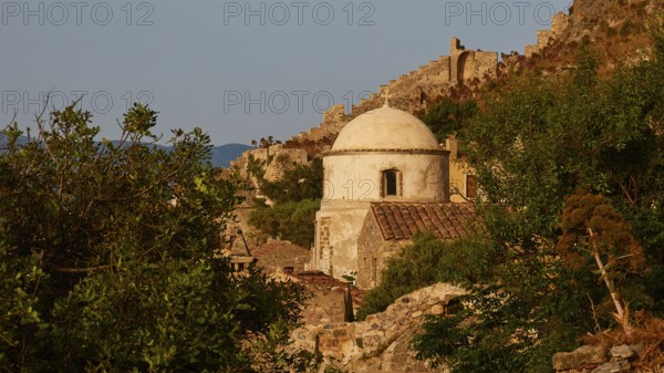 Soft morning light, small church surrounded by ruins and vegetation on a rock at morning light, Monemvasia, Monemvassia, Malvasy, small Byzantine town, rocky island, fortress, Laconia, Peloponnese, peninsula, Greece