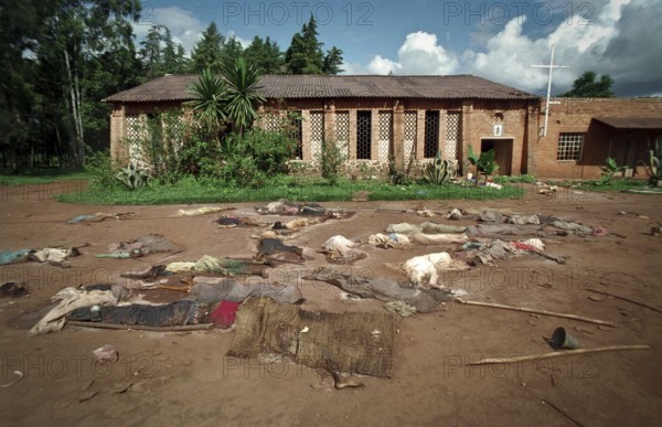 RWA Rwanda Nyamata Victims of the genocide lie in front of a church in Nyamata south of the capital Kigali. Many Tutsi fled to Catholic houses of worship to avoid death, but were also killed there. RWA Rwanda Nyamata dead bodies lie in front of a church at Nyamata south of Kigali. Many victims try escape into Catholic churches, but where slaughter even there