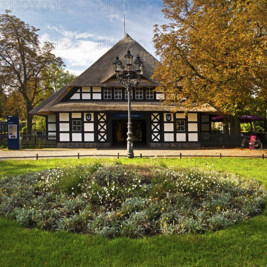 Entrance to Dahlem-Dorf subway station, thatched half-timbered house in the style of a North German manor house, Berlin-Dahlem, Berlin, Germany