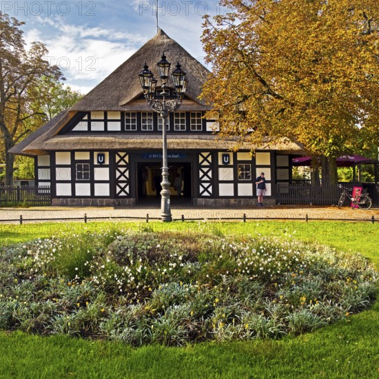 Entrance to Dahlem-Dorf subway station, thatched half-timbered house in the style of a North German manor house, Berlin-Dahlem, Berlin, Germany