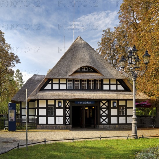 Entrance to Dahlem-Dorf subway station, thatched half-timbered house in the style of a North German manor house, Berlin-Dahlem, Berlin, Germany