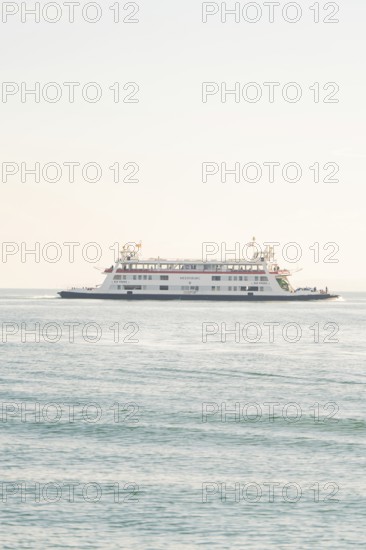 A big bright ship moves on a calm lake with a clear sky, Schiff Fahrt, Lake Constance, Germany