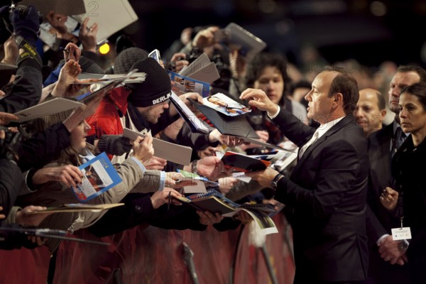 DEU, Germany, Berlin Kevin Spacey with fans in front of the opening ceremony at the Berlinale Palast Germany Berlin Kevin Spacey meets fans in front of the opening of the 61st Berlinale