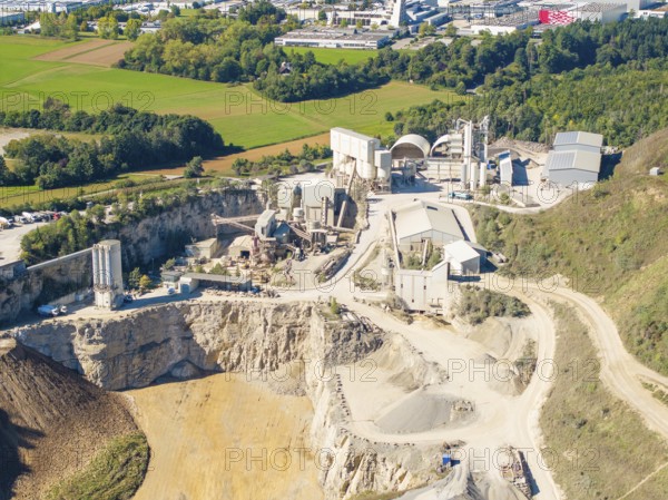 Detailed view of a quarry with diverse industrial plants and surrounding fields, Nagold, Black Forest, Germany