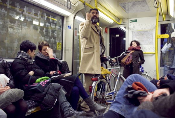 DEU Berlin passengers on the U8 towards Hermannplatz Saturday night. Germany Berlin Passengers Riding on a Tube on Saturday Night