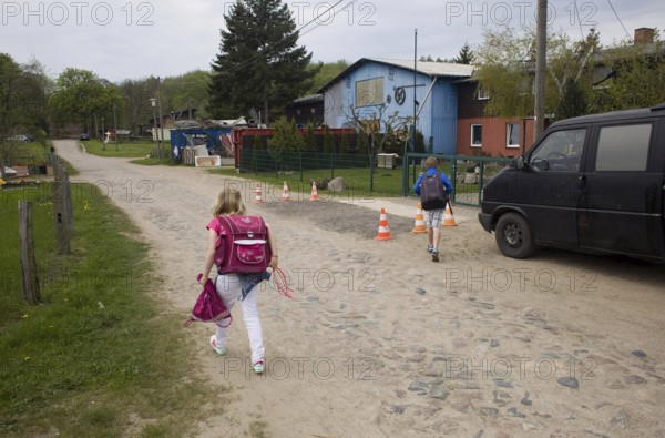 Germany JAMEL children return from school